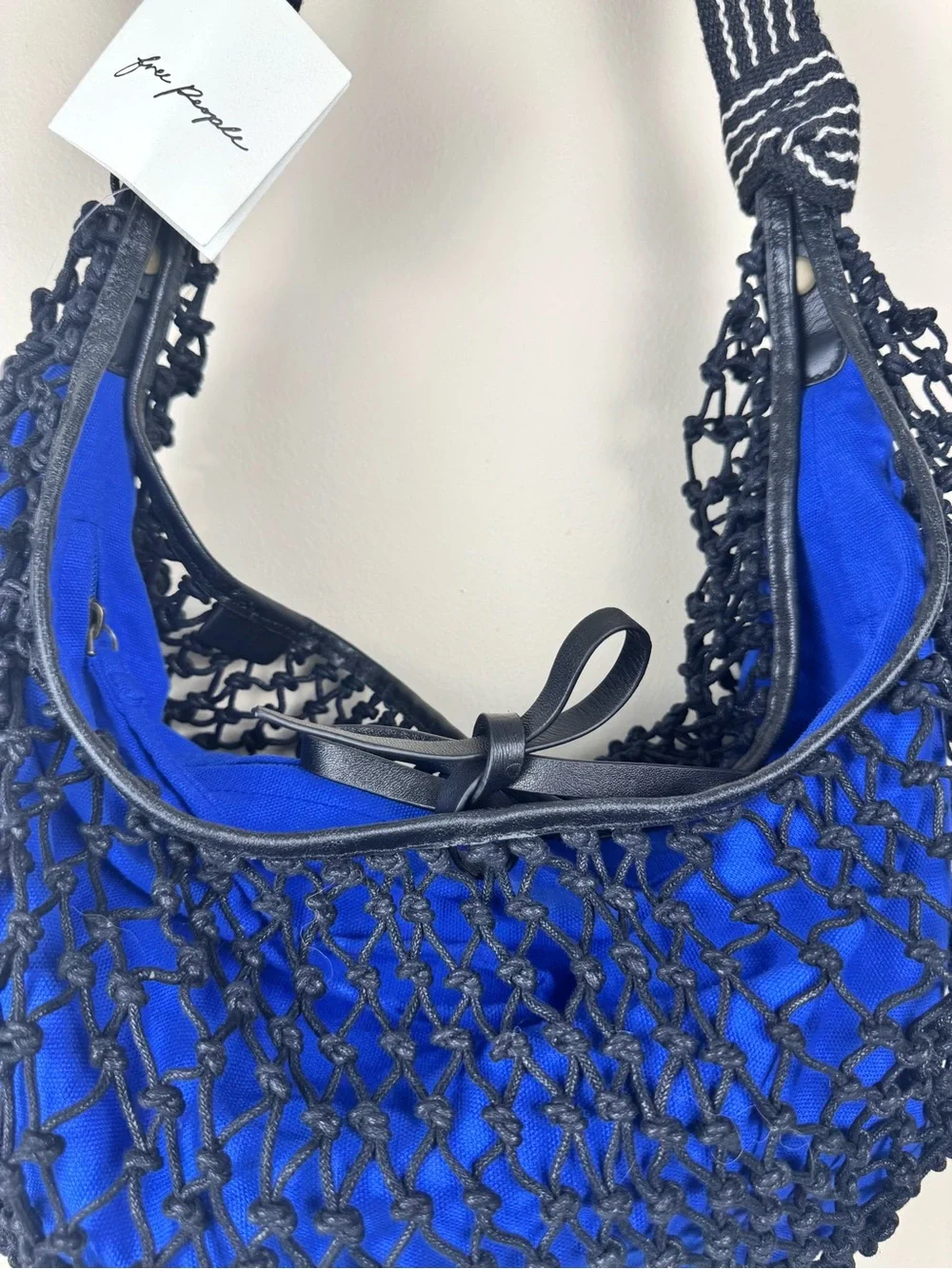 Dog Collar Flower Accessory + Free People Silver Springs Sling Bag